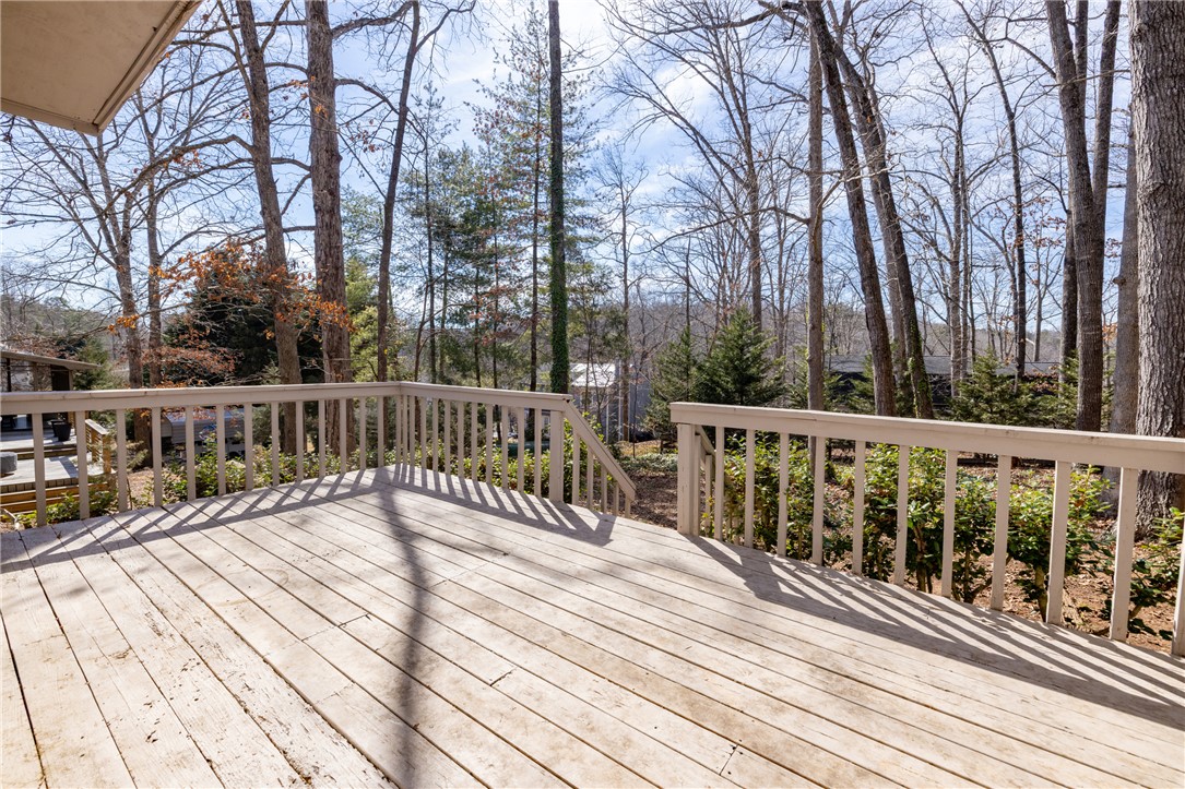 111 Shorecrest Drive Seneca, SC 29672 - Photo 27 of 35 This spacious outdoor deck offers serene views of the surrounding natural landscape.