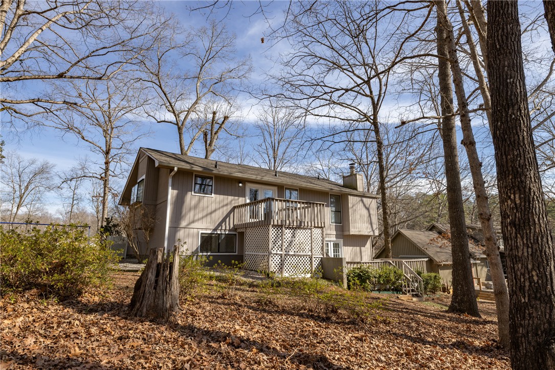 111 Shorecrest Drive Seneca, SC 29672 - Photo 28 of 35 This elevated home is framed by trees, offering a serene escape.