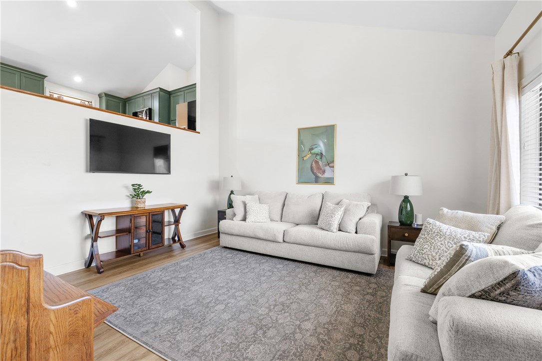 111 Shorecrest Drive Seneca, SC 29672 - Photo 3 of 35 This living area features high ceilings and elegant flooring, creating an expansive and inviting atmosphere.