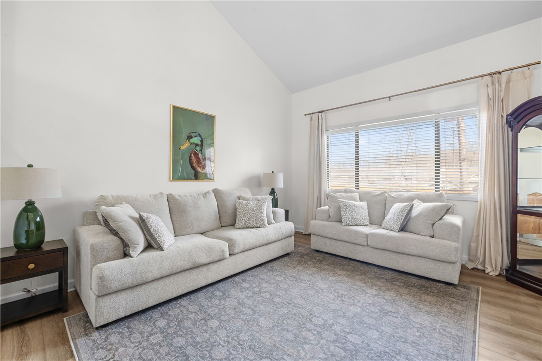111 Shorecrest Drive Seneca, SC 29672 - Photo 7 of 35 This airy living space features abundant natural light, creating an inviting atmosphere for relaxation and gatherings.