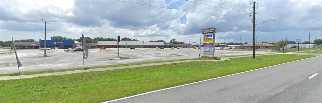 910 North Main Street, Unit 910 Bushnell, FL 33513 - Photo 1 of 8 a view of a park with a garden