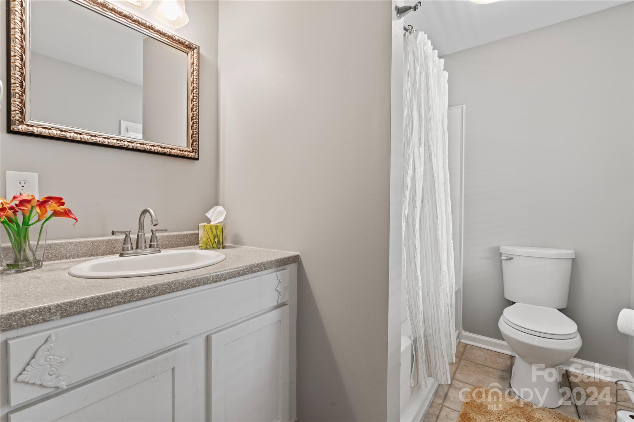 1270 Pole Branch Road Clover, SC 29710 - Photo 24 of 41 a bathroom with a toilet sink and mirror
