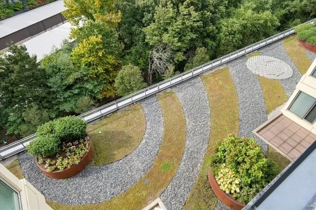 a view of swimming pool from a balcony