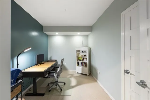 a workspace with furniture and wooden floor