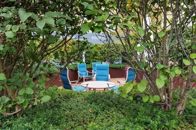 a sign that is on a brick wall