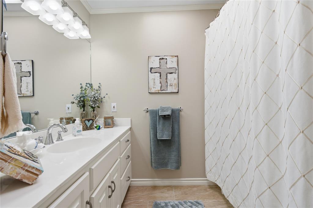 820 Toribrooke Athens, TX 75751 - Photo 15 of 23 a bathroom with a sink and a mirror