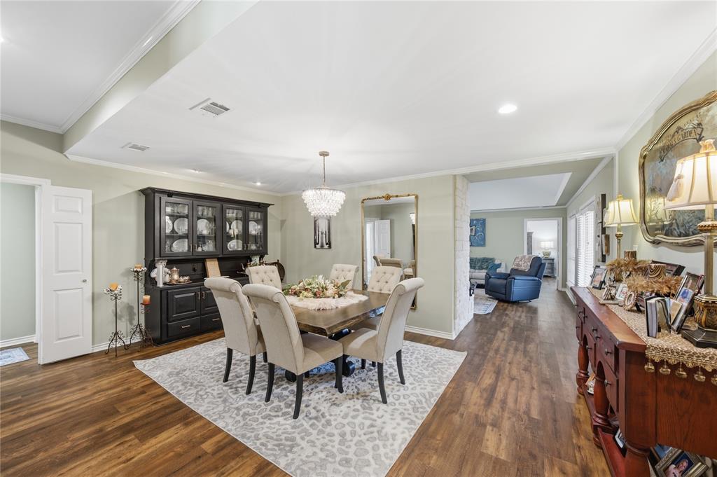 820 Toribrooke Athens, TX 75751 - Photo 6 of 23 a view of a dining room with furniture and wooden floor
