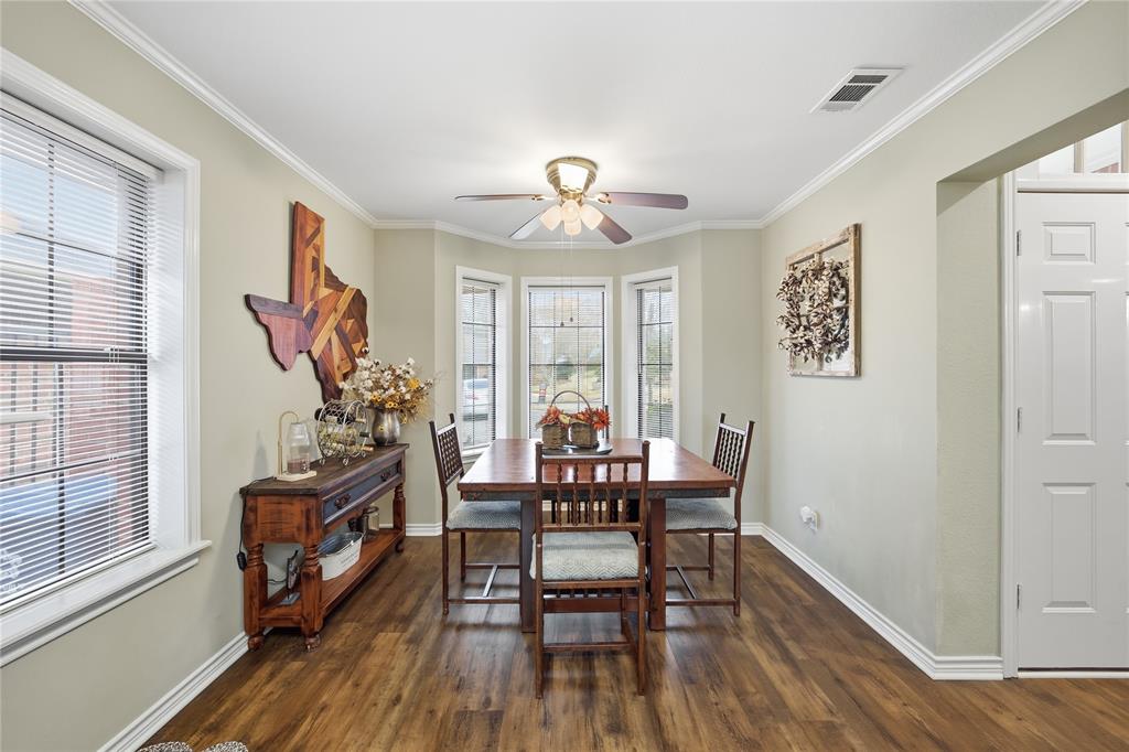 820 Toribrooke Athens, TX 75751 - Photo 7 of 23 a view of a livingroom with furniture window and wooden floor