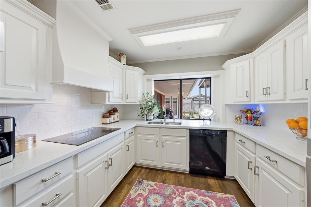 820 Toribrooke Athens, TX 75751 - Photo 10 of 23 a kitchen with sink cabinets and window