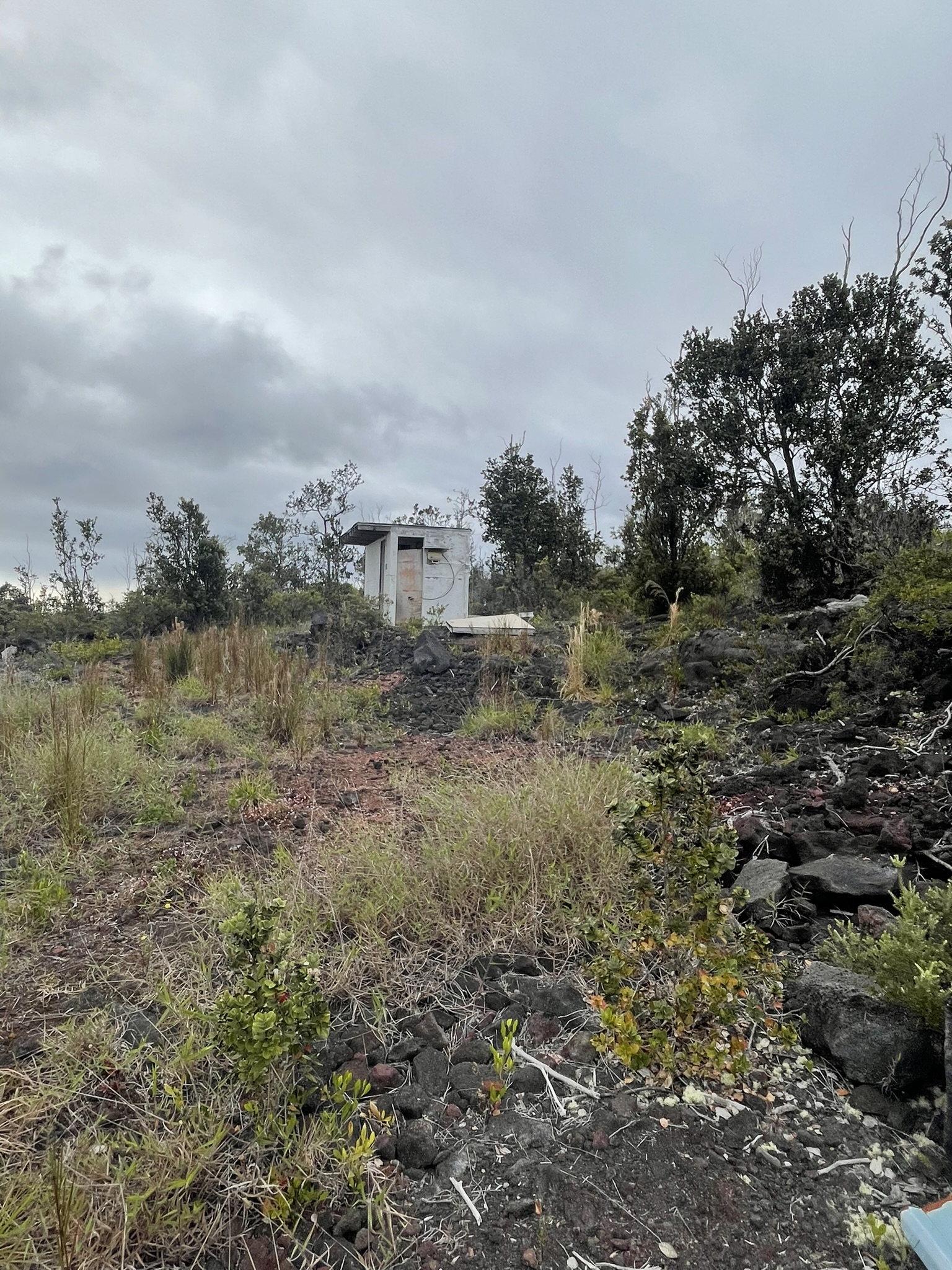 92-2584 Lot 7 Sea View Drive Ocean View, HI 96704 - Photo 10 of 10 a view of a field of grass and trees