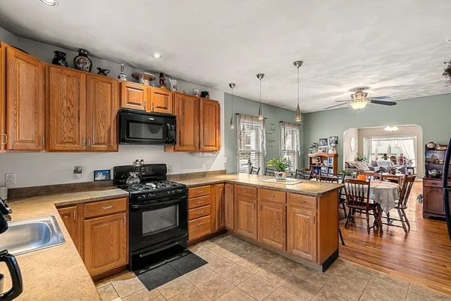 a kitchen with lots of counter top space and appliances