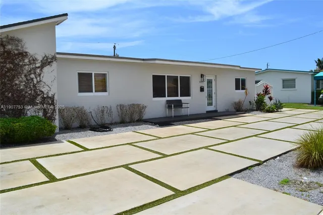 a house view with a outdoor space