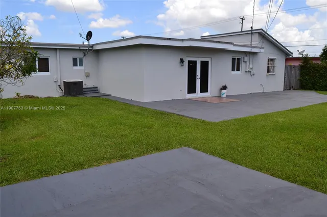 a house view with a garden space