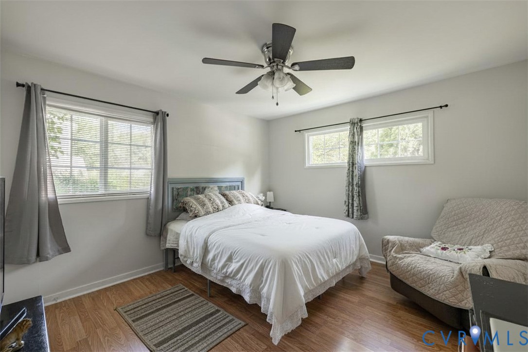 9217 Fisk Road Richmond, VA 23229 - Photo 20 of 39 a bedroom with a bed and window