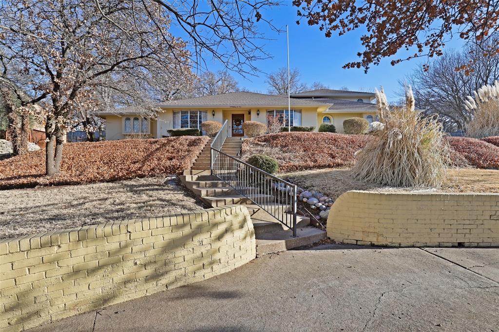 front view of a house with yard