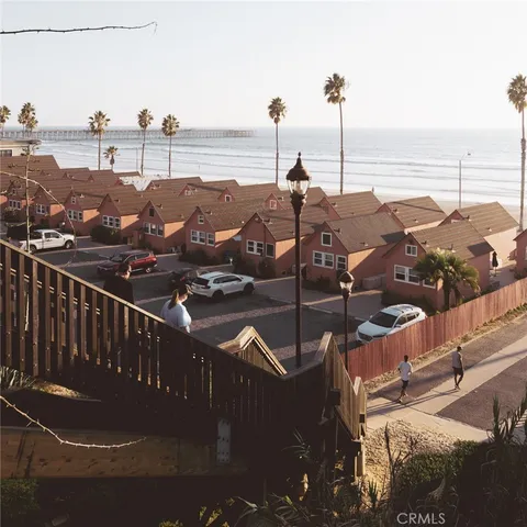 a view of house with outdoor seating