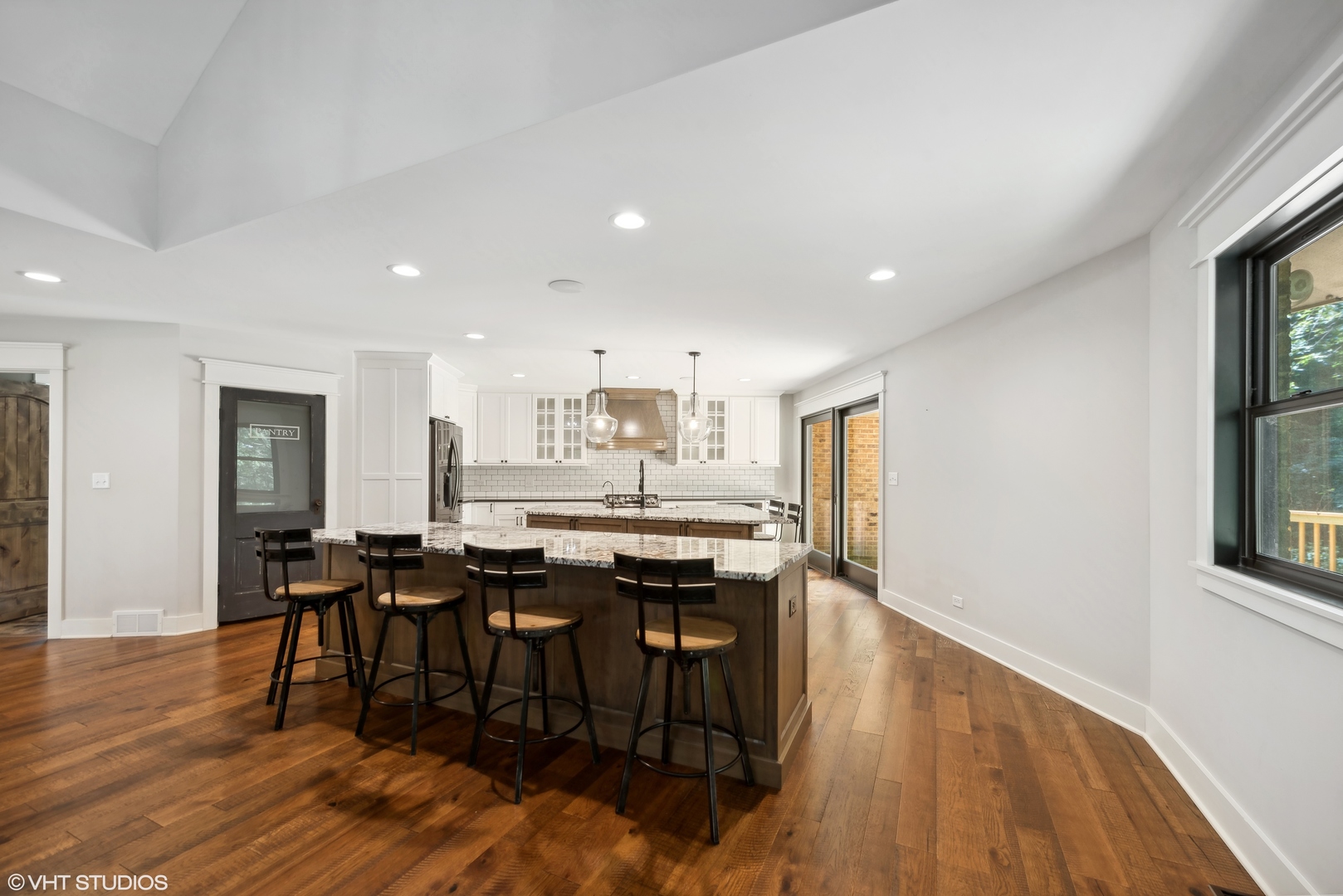 268 Stonegate Road Cary, IL 60013 - Photo 6 of 35 a view of a dining room with furniture and wooden floor