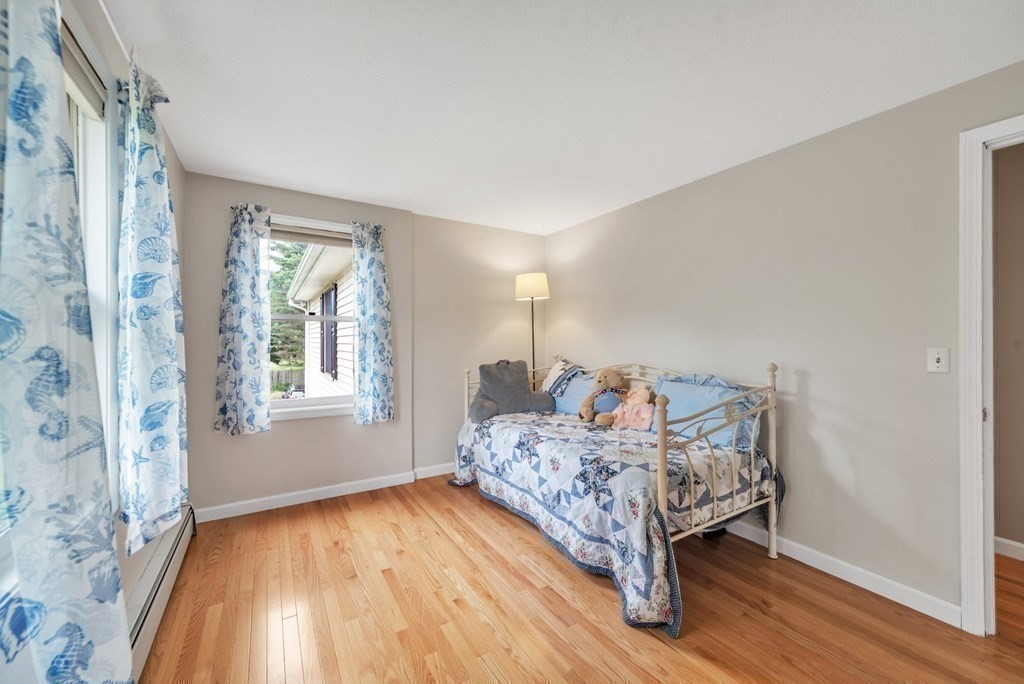 4 Stony Hill Road Hampden, MA 01036 - Photo 13 of 40 a bed room with a bed and a window