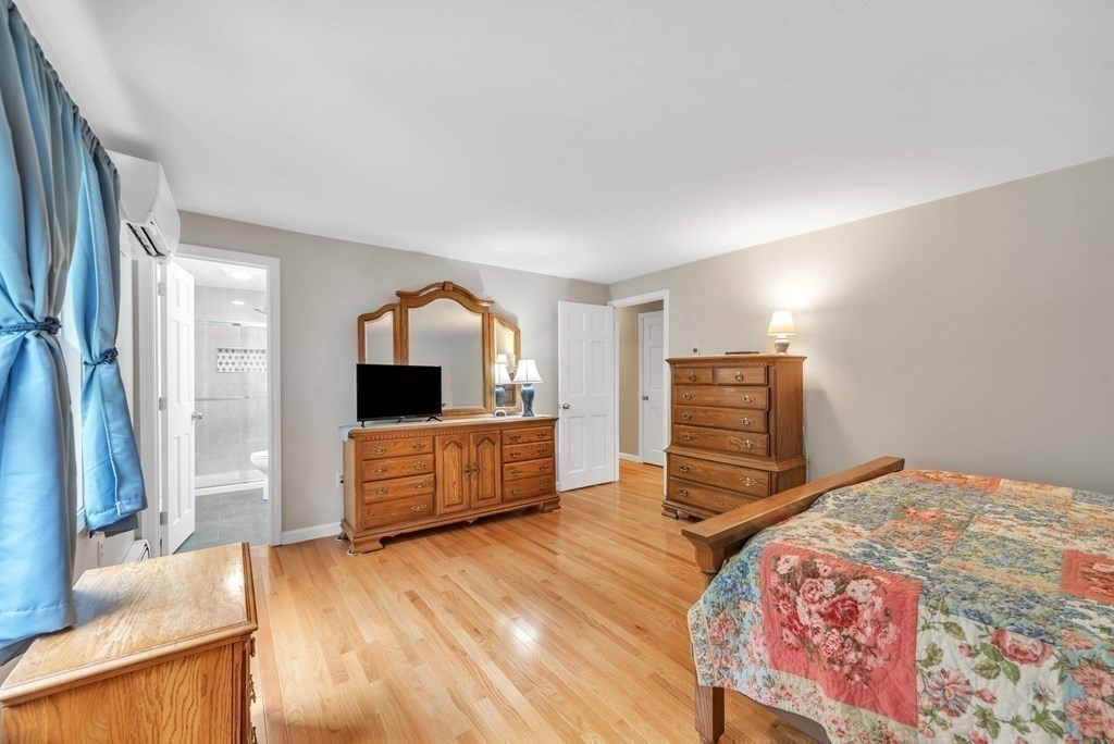 4 Stony Hill Road Hampden, MA 01036 - Photo 16 of 40 a bedroom with furniture and a flat screen tv