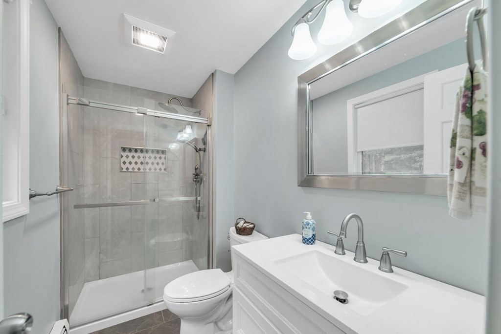 4 Stony Hill Road Hampden, MA 01036 - Photo 17 of 40 a bathroom with a sink a toilet and shower