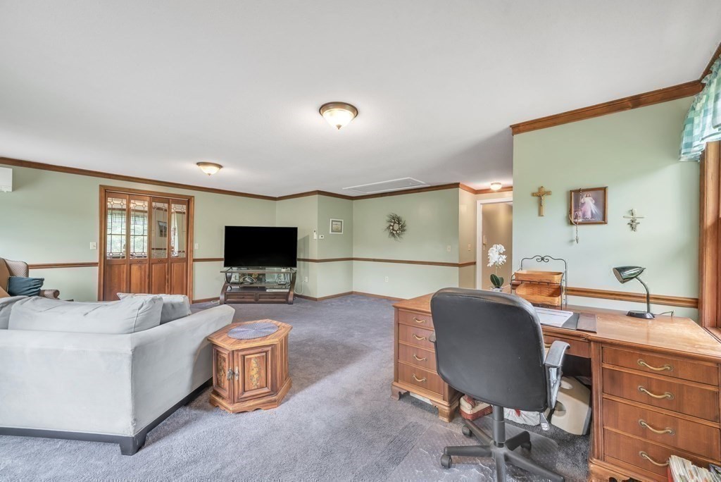 4 Stony Hill Road Hampden, MA 01036 - Photo 19 of 40 a living room with furniture and a flat screen tv