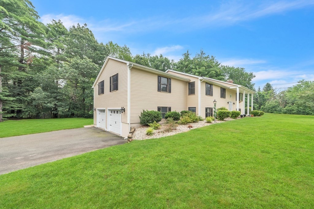 4 Stony Hill Road Hampden, MA 01036 - Photo 2 of 40 a view of a house with backyard and garden