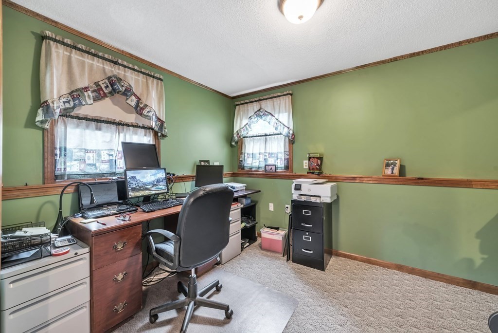 4 Stony Hill Road Hampden, MA 01036 - Photo 21 of 40 a view of a workspace with furniture and a window