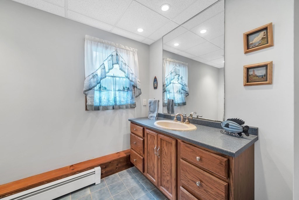 4 Stony Hill Road Hampden, MA 01036 - Photo 24 of 40 a bathroom with a sink and a mirror