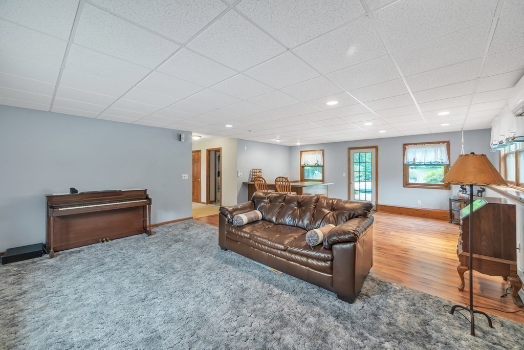4 Stony Hill Road Hampden, MA 01036 - Photo 25 of 40 a living room with furniture and a window