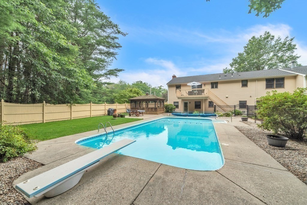 4 Stony Hill Road Hampden, MA 01036 - Photo 31 of 40 a view of a swimming pool with a garden