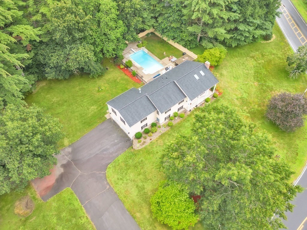 4 Stony Hill Road Hampden, MA 01036 - Photo 38 of 40 an aerial view of a house with a yard and trees all around