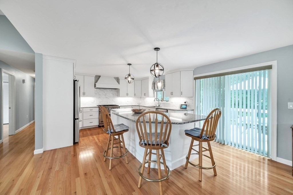 4 Stony Hill Road Hampden, MA 01036 - Photo 6 of 40 a view of a dining room with furniture and wooden floor
