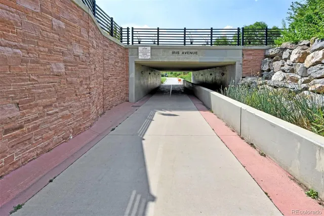 a view of balcony with wooden floor