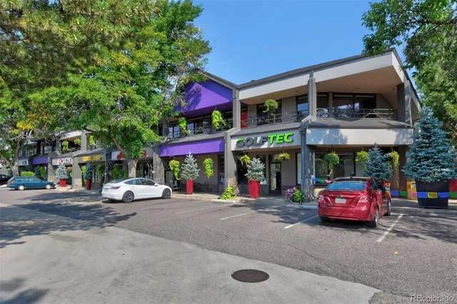 a car parked in front of a building
