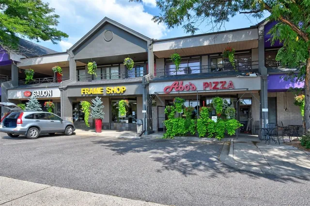 a view of street with shops