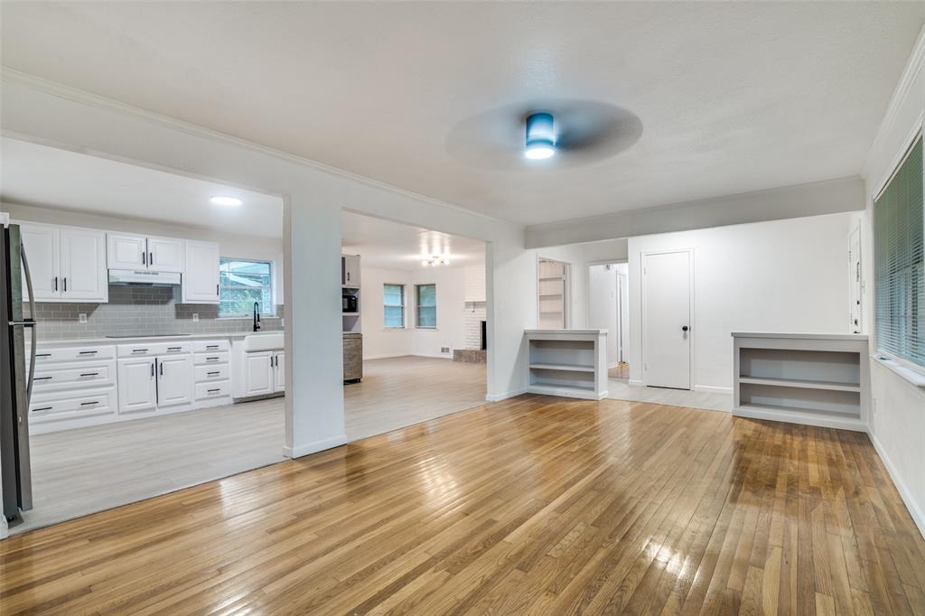 3308 Ranch Drive Garland, TX 75041 - Photo 10 of 25 a view of a kitchen with wooden floor