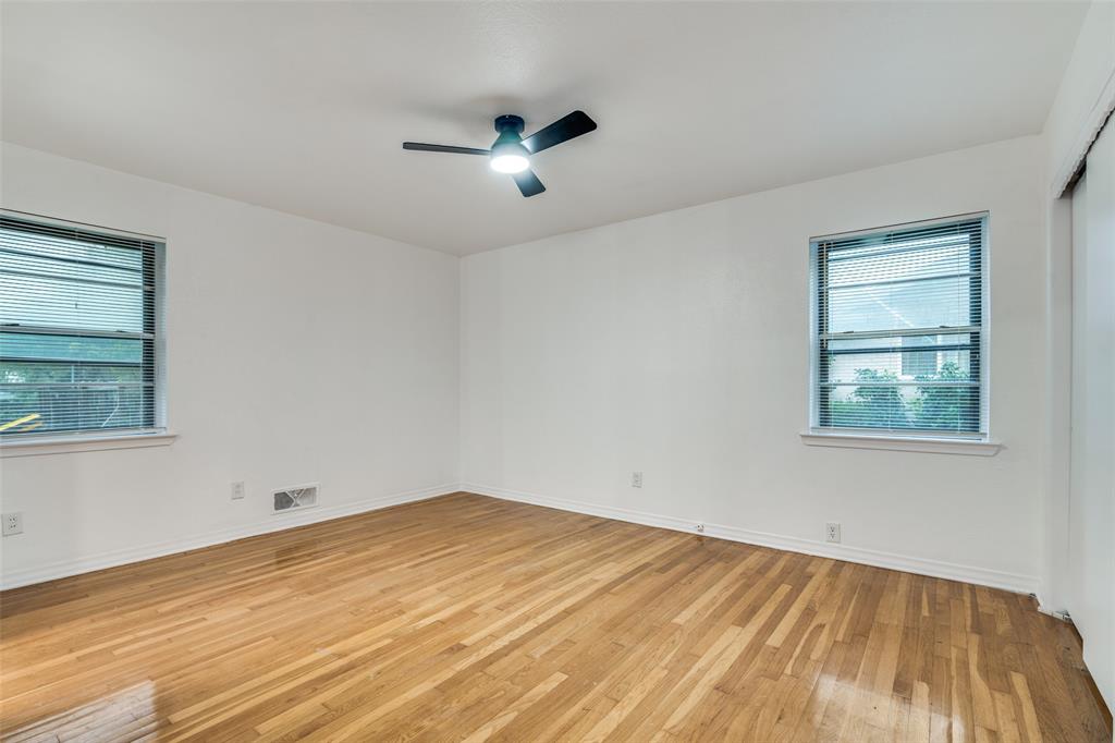 3308 Ranch Drive Garland, TX 75041 - Photo 15 of 25 a view of empty room with wooden floor