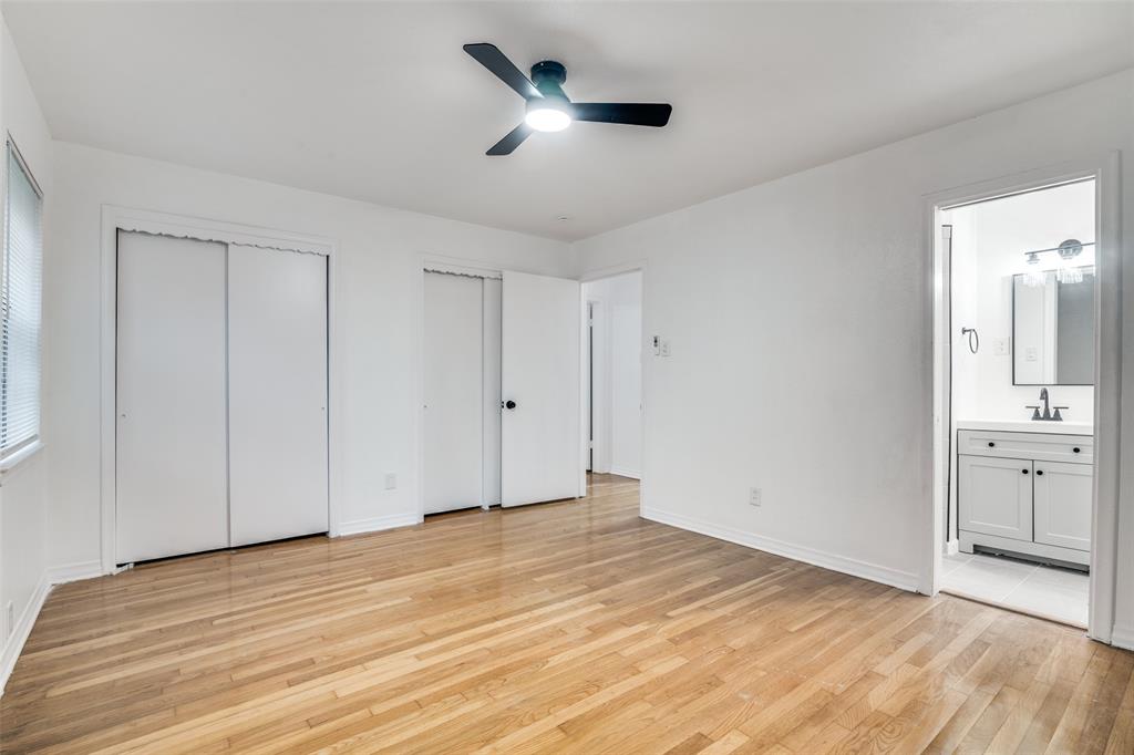 3308 Ranch Drive Garland, TX 75041 - Photo 17 of 25 a view of empty room with wooden floor and ceiling fan