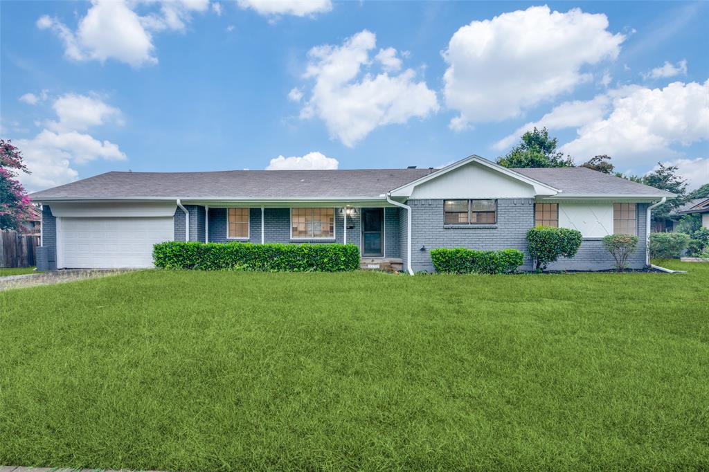 3308 Ranch Drive Garland, TX 75041 - Photo 2 of 25 a view of a house with backyard and garden