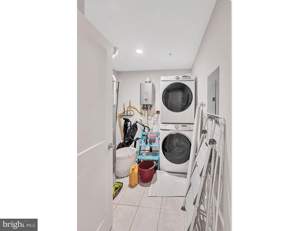 2444 Ontario Road Northwest, Unit 2 Washington, DC 20009 - Photo 18 of 29 a living room with furniture and a fireplace