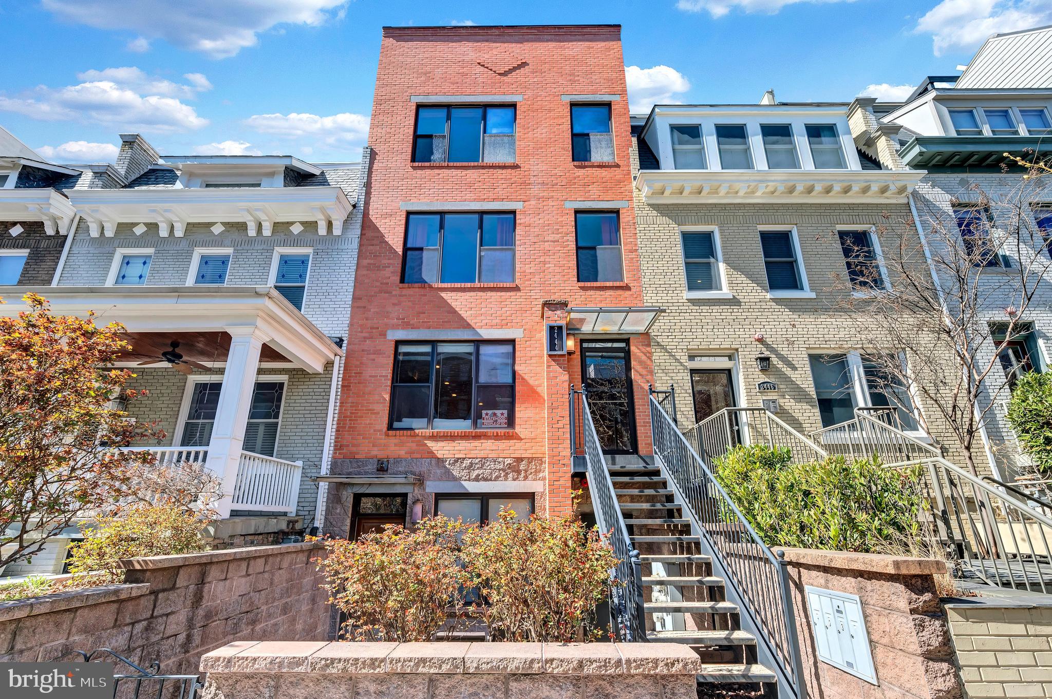 2444 Ontario Road Northwest, Unit 2 Washington, DC 20009 - Photo 22 of 29 a front view of a multi story building