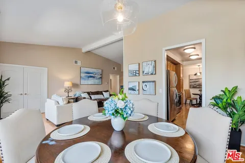 a dining room with furniture and a table