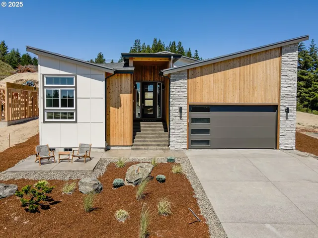 a front view of a house with a outdoor space