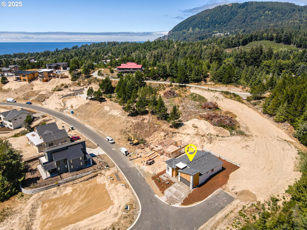 413 Meadows Drive Nehalem, OR 97131 - Photo 4 of 13 an aerial view of residential houses with outdoor space