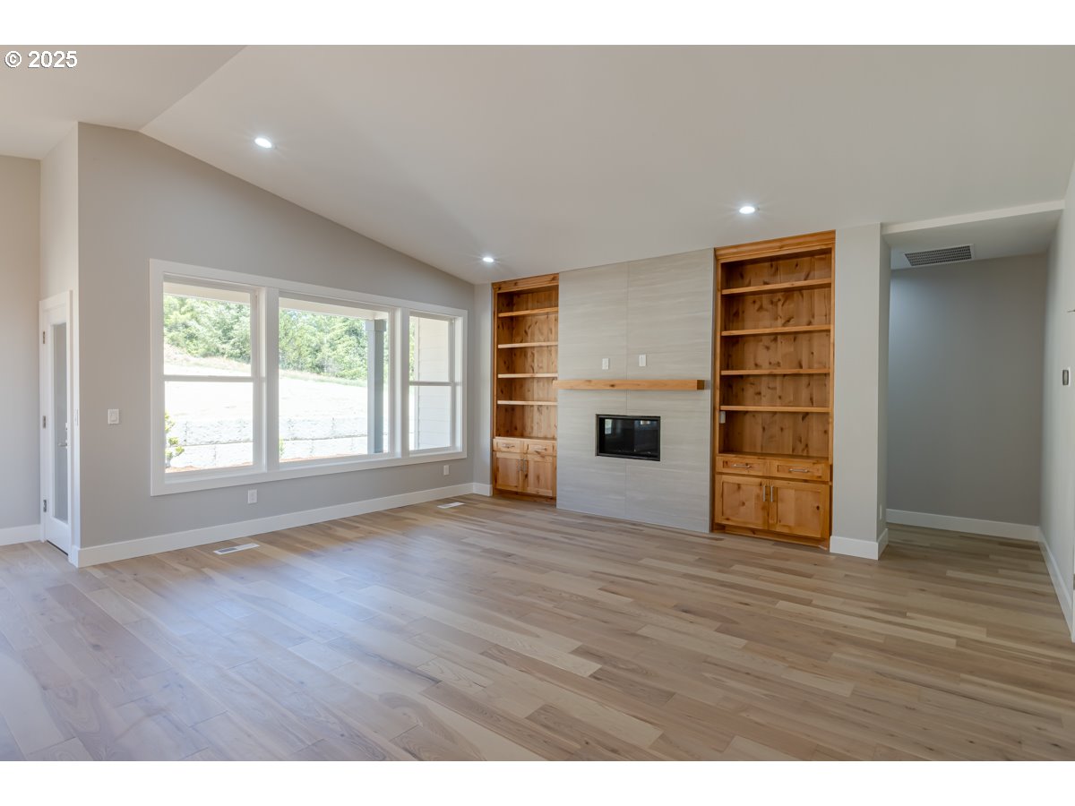 413 Meadows Drive Nehalem, OR 97131 - Photo 7 of 13 a view of a livingroom with a fireplace