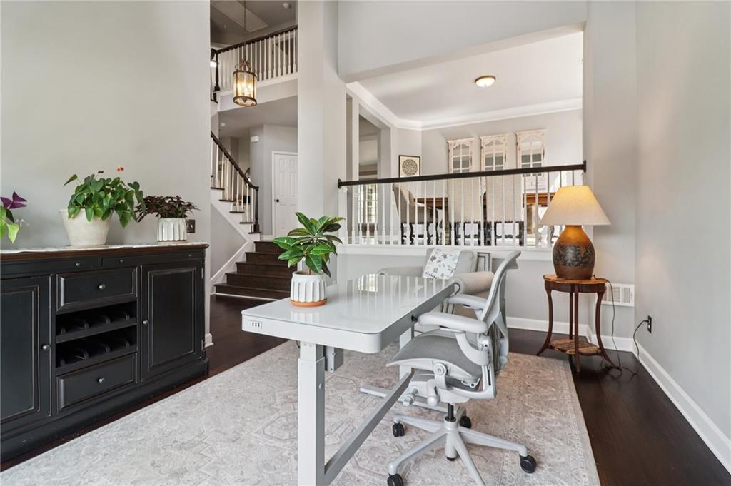 5840 Masters Club Drive Suwanee, GA 30024 - Photo 29 of 72 a view of a livingroom with furniture and staircase