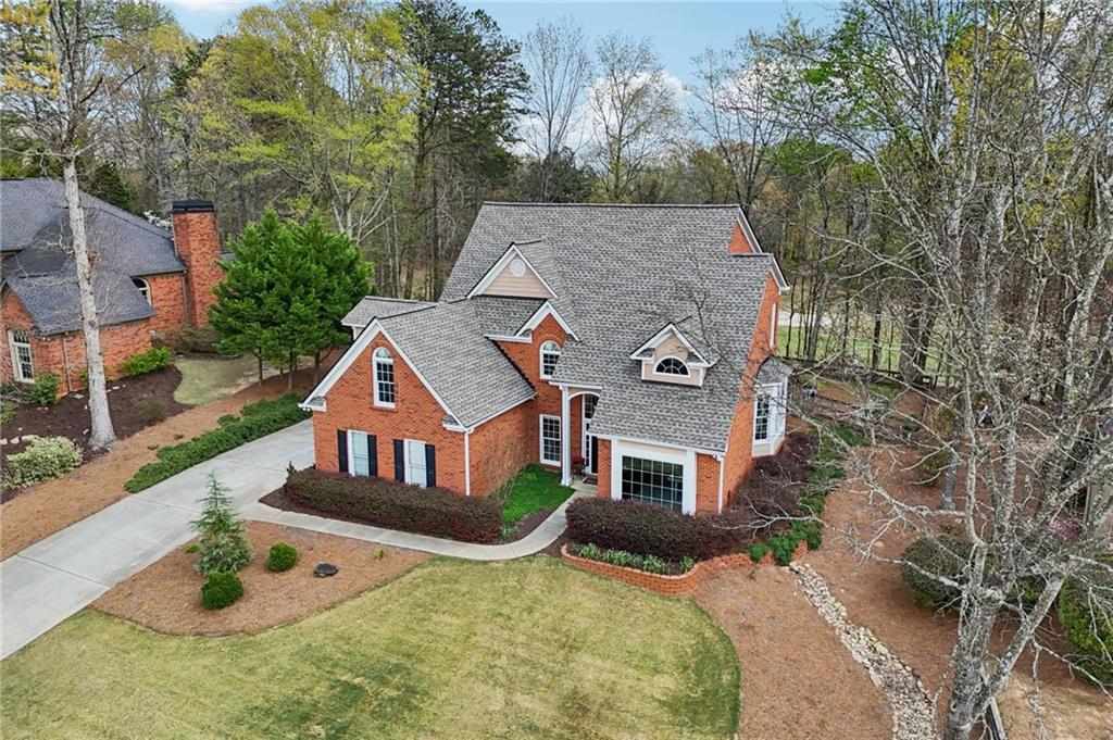 5840 Masters Club Drive Suwanee, GA 30024 - Photo 58 of 72 aerial view of a house with a yard