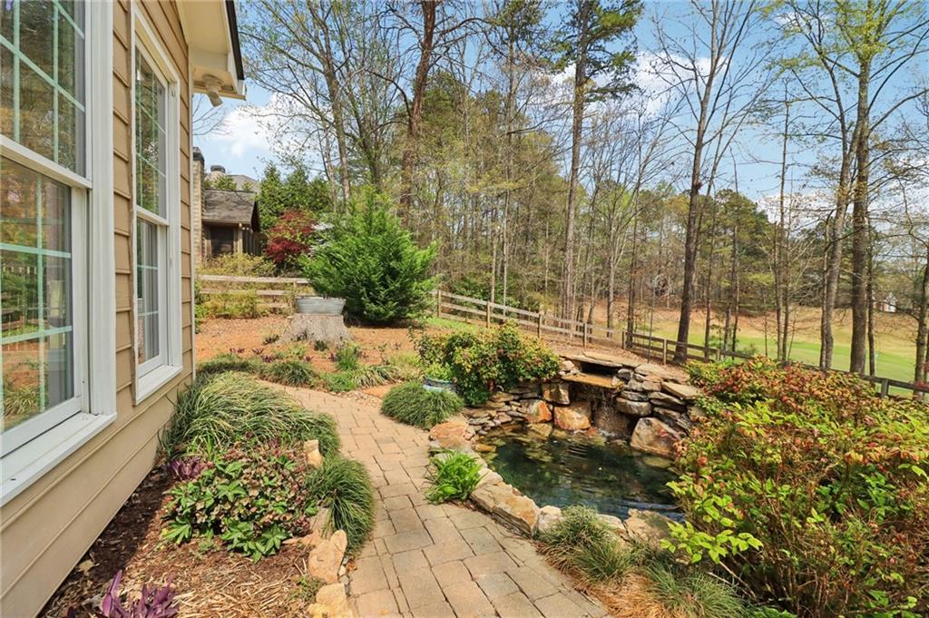 5840 Masters Club Drive Suwanee, GA 30024 - Photo 63 of 72 a view of backyard of the house