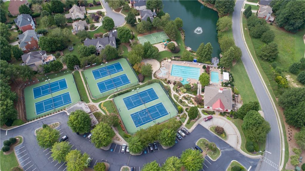 5840 Masters Club Drive Suwanee, GA 30024 - Photo 9 of 72 an aerial view of a house swimming pool outdoor seating and yard
