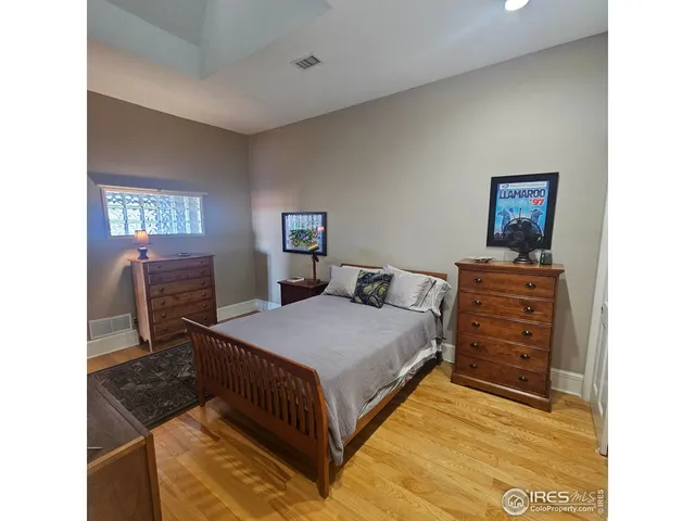 a bathroom with a sink vanity and mirror